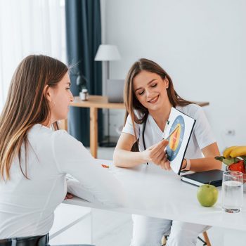 woman-showing-illustration-to-the-female-customer-resize-pttloswhei6f6se6snhpldvxp5cflv0znyoar1z86k woman-showing-illustration-to-the-female-customer-resize-pttloswhei6f6se6snhpldvxp5cflv0znyoar1z86k